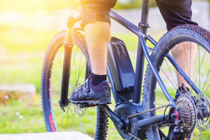 Man riding an electric bicycle