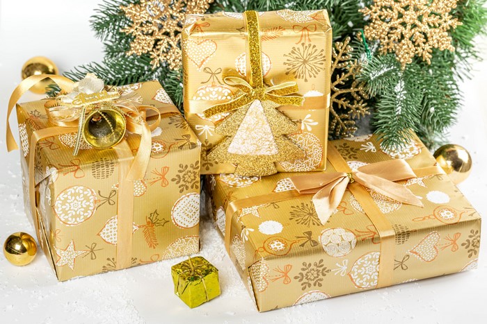Christmas Gifts with Gold Bows and Ornaments