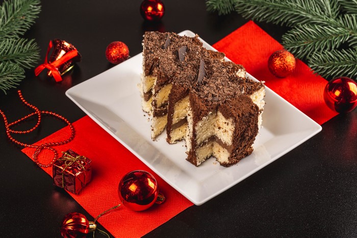 Chocolate cake slices with Christmas decorations