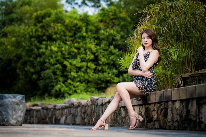 4K Asian Woman Sitting in Dress