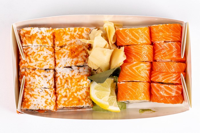 Sushi with salmon, caviar, and lemon