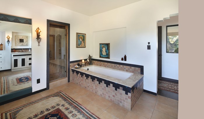Bathroom with bathtub and shower