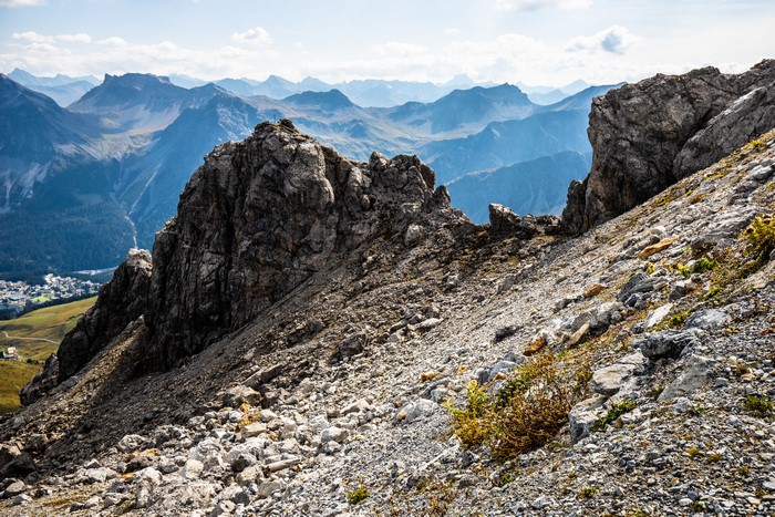 Rocky Mountainside in Switzerland with Village Below