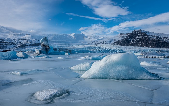 Icelandic Glacier Lagoon with Icebergs and Mountains