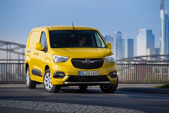 Yellow Opel Combo-e Cargo XL van on a bridge
