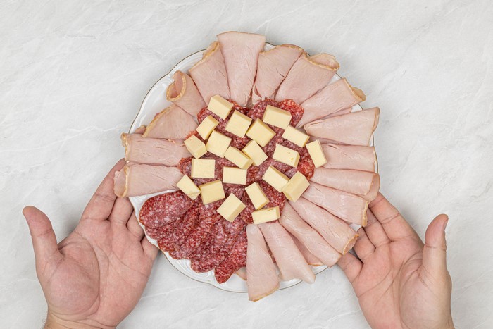 Meat and Cheese Platter with Hands