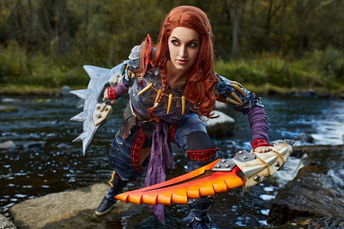 Cosplayer as Nargacuga Armor from Monster Hunter with swords