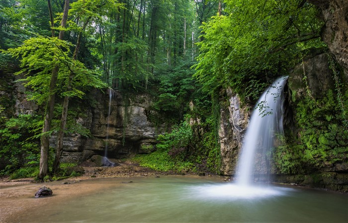 4K Waterfalls in Lush Green Forest