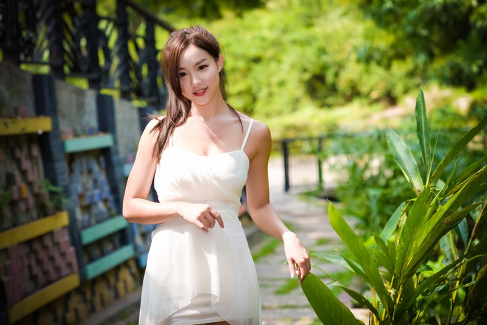 4K Asian Woman in White Dress with Bokeh