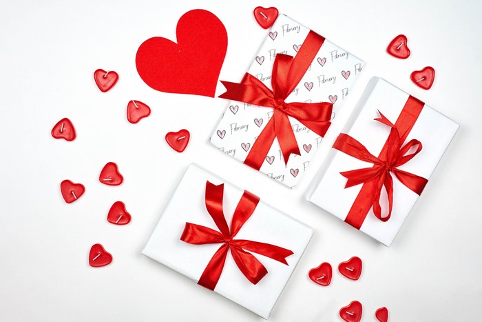 Valentine's Day Gifts with Red Hearts and Ribbons
