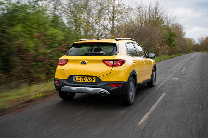 Yellow 2021 KIA Stonic Crossover in Motion on UK Road