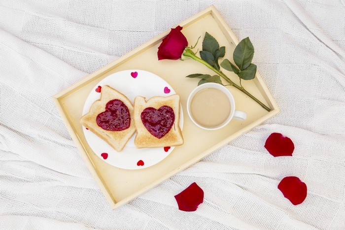 Valentine's Day breakfast tray with rose and coffee