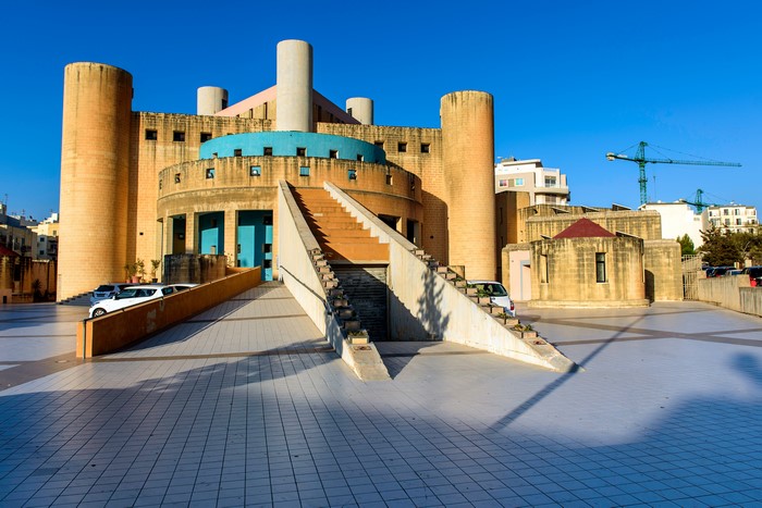 Modern building with cylindrical towers in Qawra, Malta