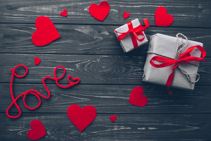 Valentine's Day gifts and hearts on wood