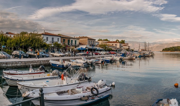 Boats docked in a harbor in Galaxidi, Greece