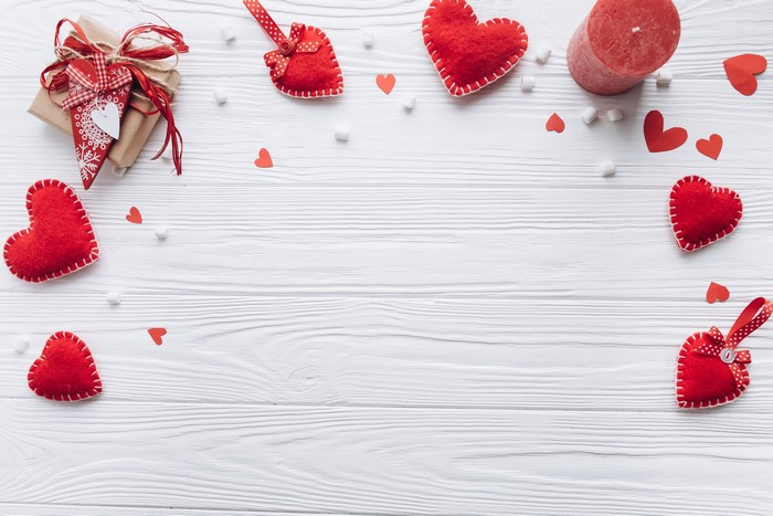 Valentine's Day gift with red hearts and candle