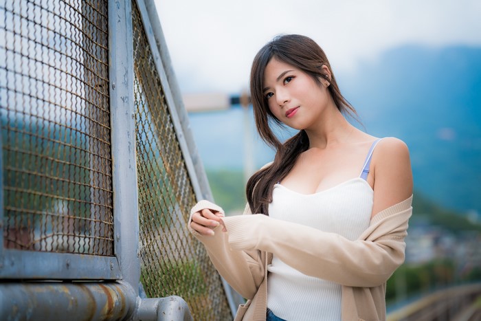 Asian Brunette Girl in White Top and Cardigan
