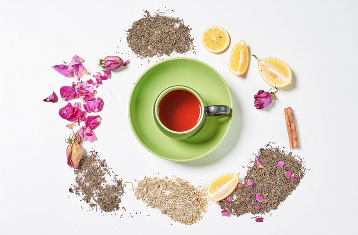 Tea with lemons, rose petals, and cinnamon