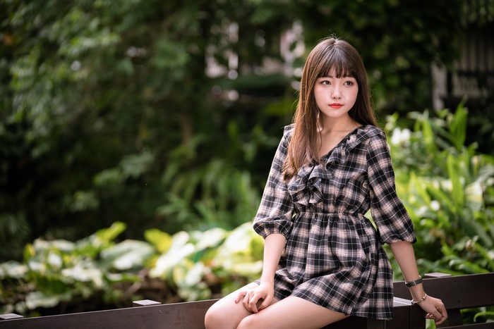 4K Asian Woman Sitting in Garden