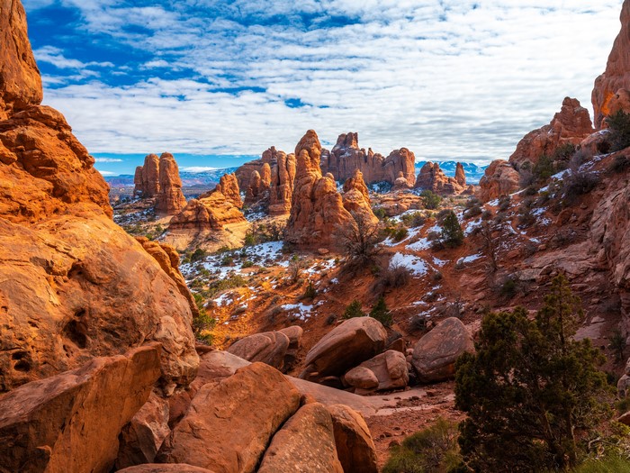 Arches National Park with Snow and Clouds