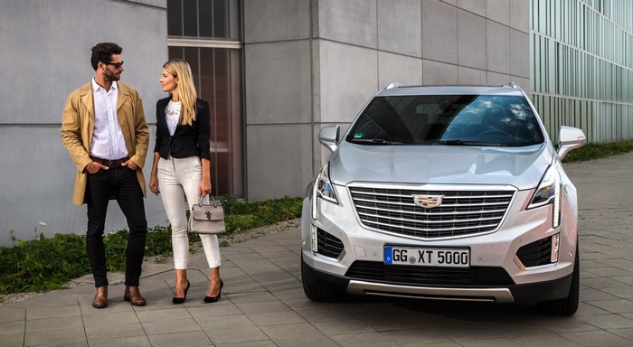 Cadillac XT5 Crossover with a couple