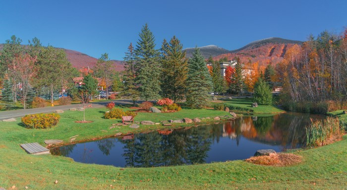 Autumn scene with pond and mountains in Vermont