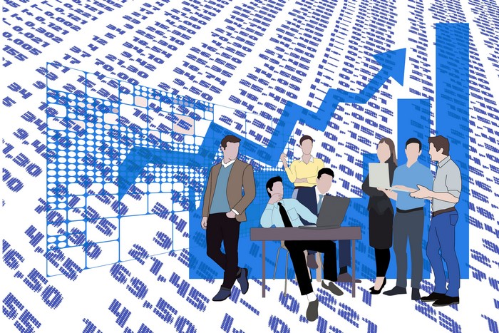 Business people analyzing financial data with growth chart