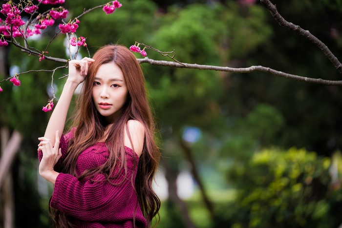 4K Portrait of Asian Woman with Branches