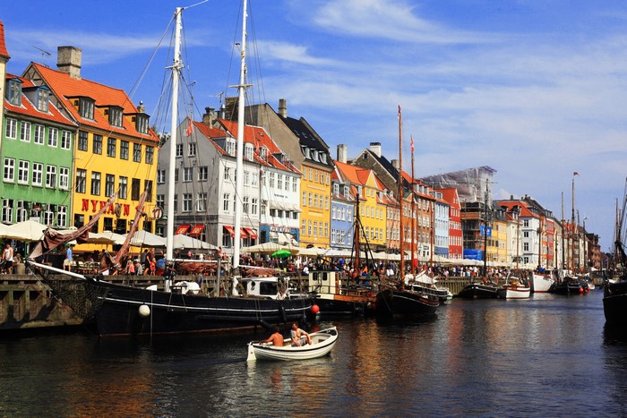 Nyhavn Canal in Copenhagen, Denmark with Boats and Houses