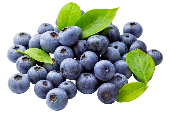 Blueberries with green leaves on white background