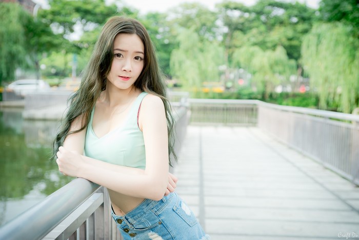 Asian woman in shorts and tank top