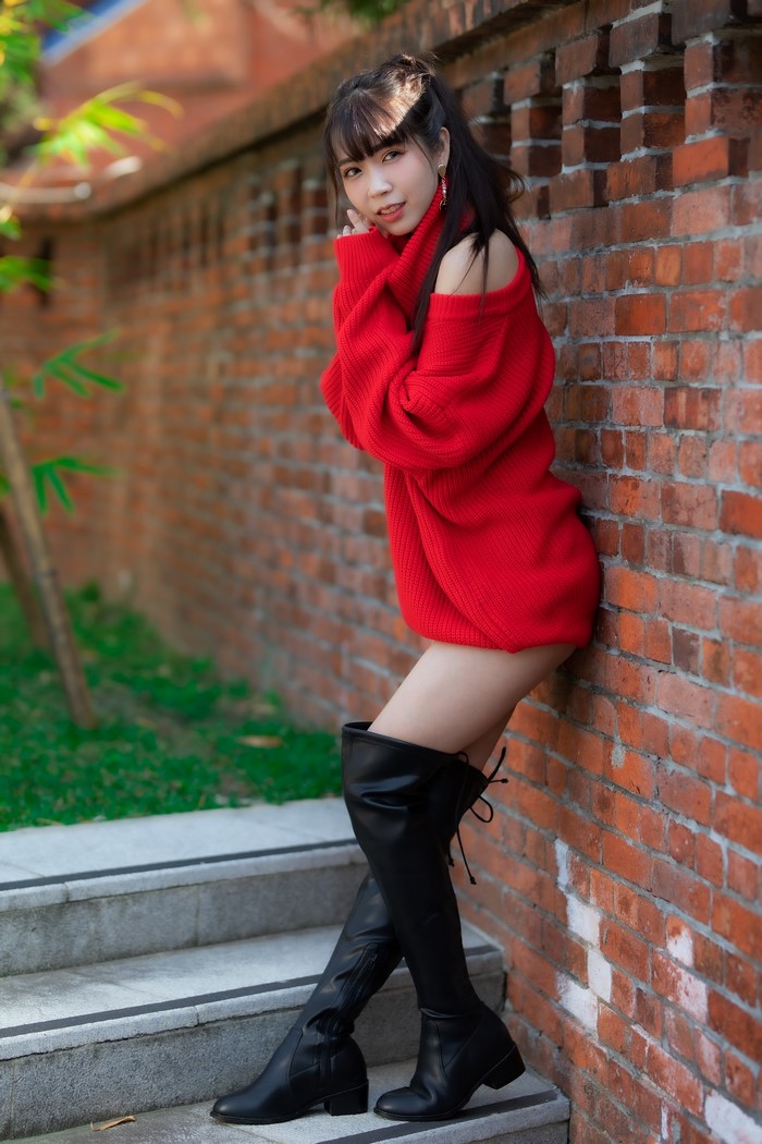Asian Woman in Red Sweater and Black Boots