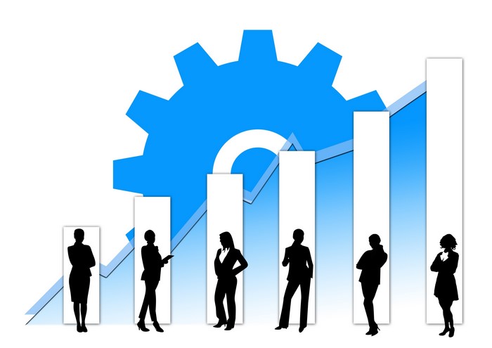 Business growth with gear and silhouettes