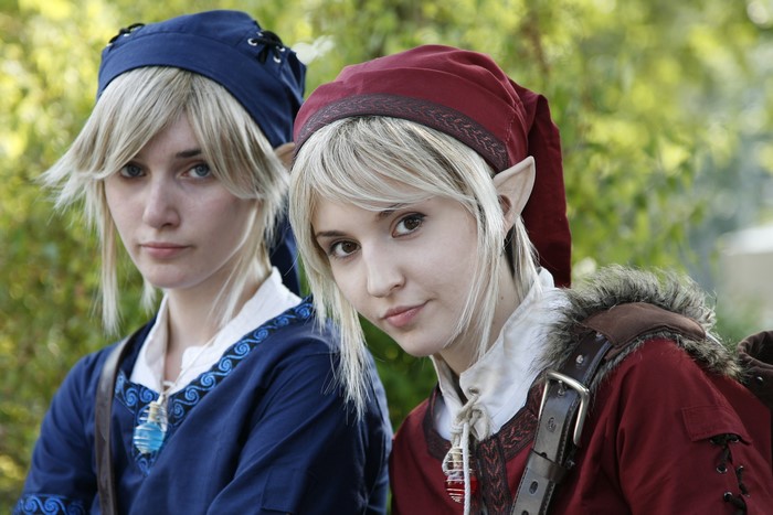 Two cosplayers dressed as Link from The Legend of Zelda