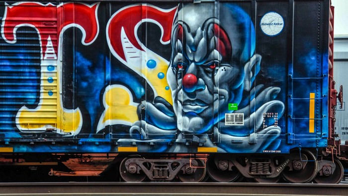 Graffiti of a clown on a train car