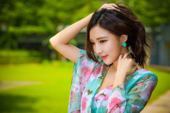 Asian Woman in Floral Dress with Bokeh