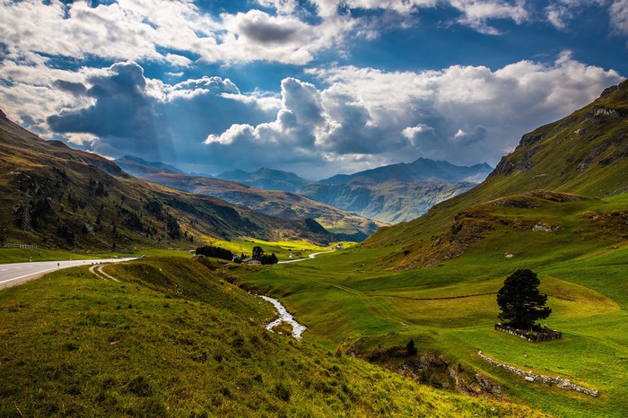 Switzerland Alps Mountains Valley with Clouds