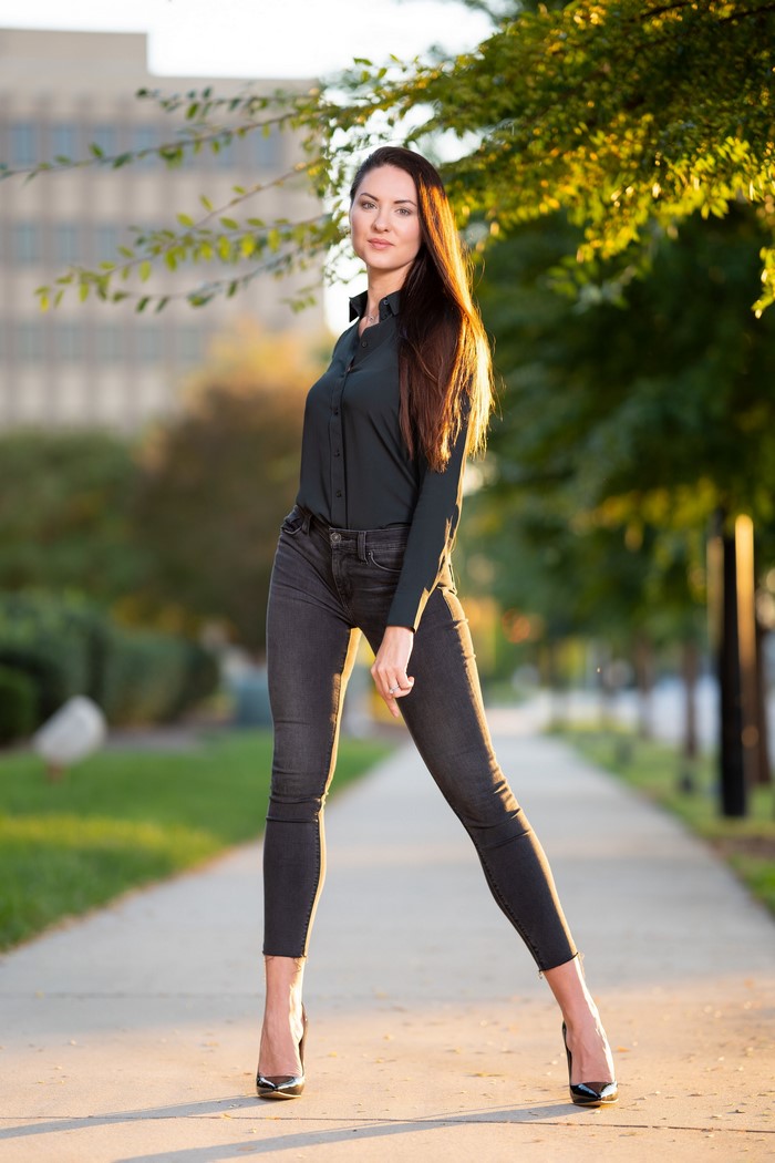 Natalia Larioshina posing in jeans and formal shirt