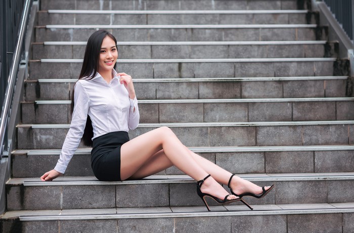 4K Asian Woman Sitting on Stairs