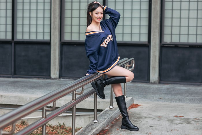 Stylish Asian Woman Posing in Boots 4K