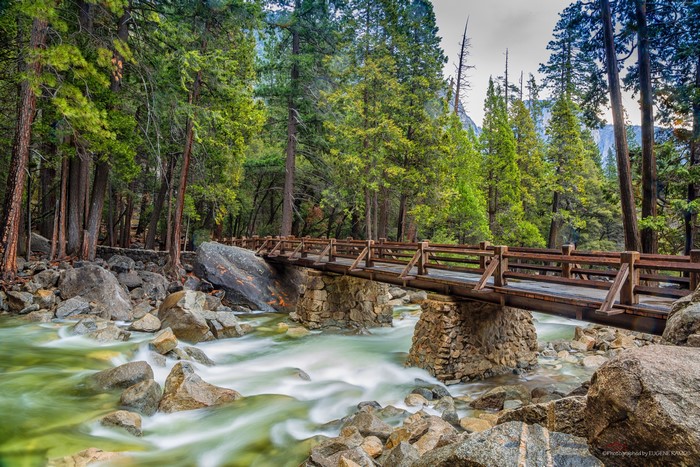 Wooden bridge over a river in Yosemite National Park, California