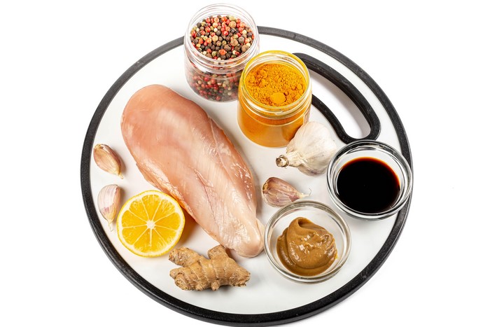 Chicken breast with spices, lemon, garlic, and sauces