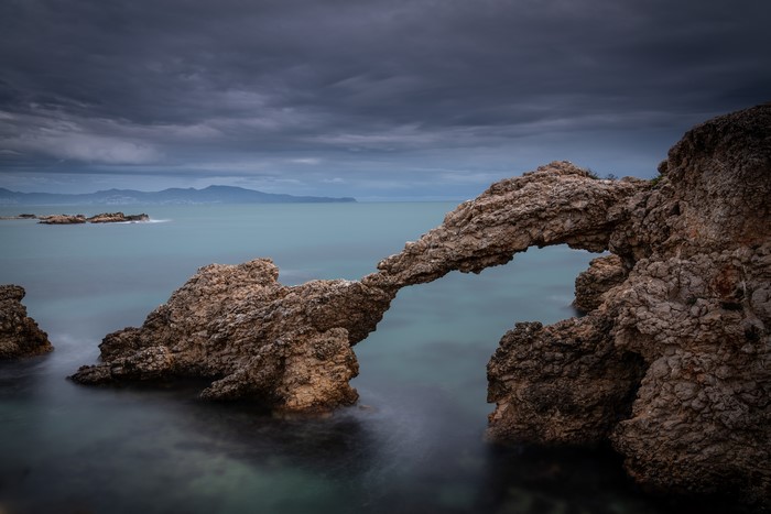 Rock Arch over the Sea in Girona, Spain