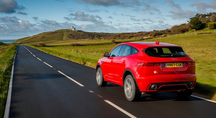 Red Jaguar E-Pace R-Dynamic driving on UK road