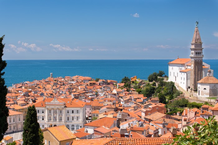 Piran, Slovenia: Coastal Town with Church and Sea