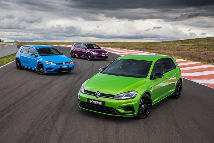 Three Volkswagen Golf R cars on a race track
