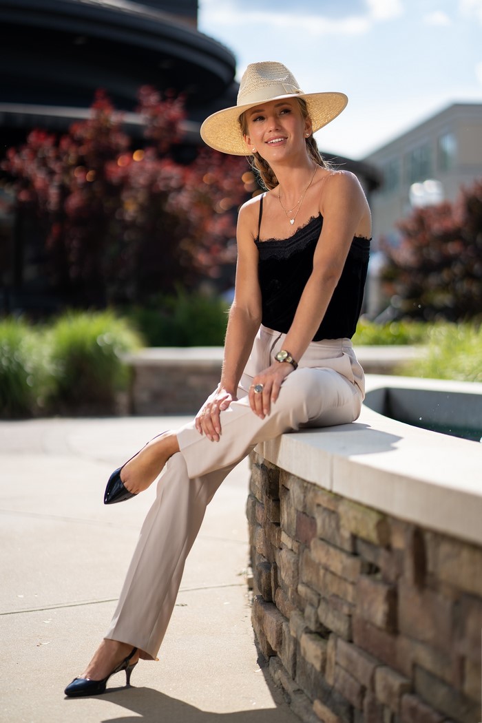 Olga Clevenger wearing a hat and trousers