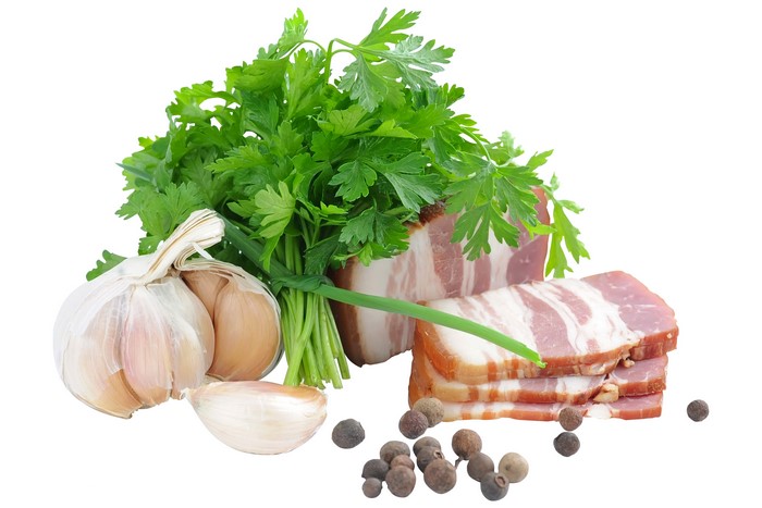 Bacon, Garlic, Parsley, and Peppercorns on White Background