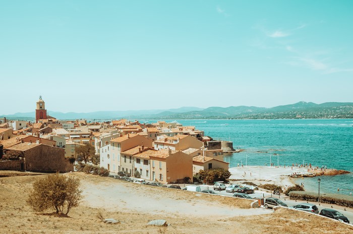 Saint-Tropez town with bell tower and sea