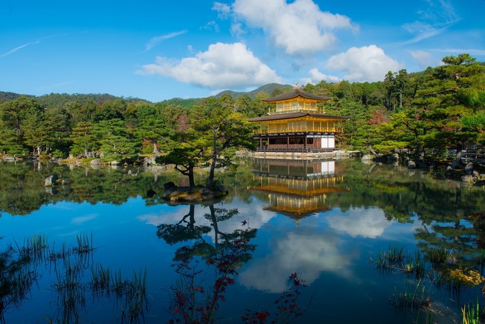 Kinkaku-ji Temple reflected in a pond in Kyoto, Japan